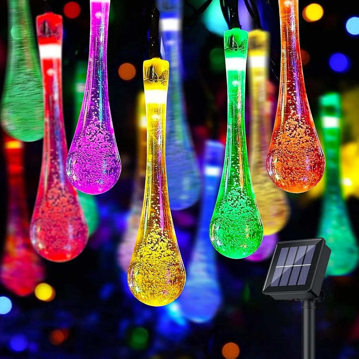 Close view of clear multicolor bubble teardrop lights and the separate solar panel