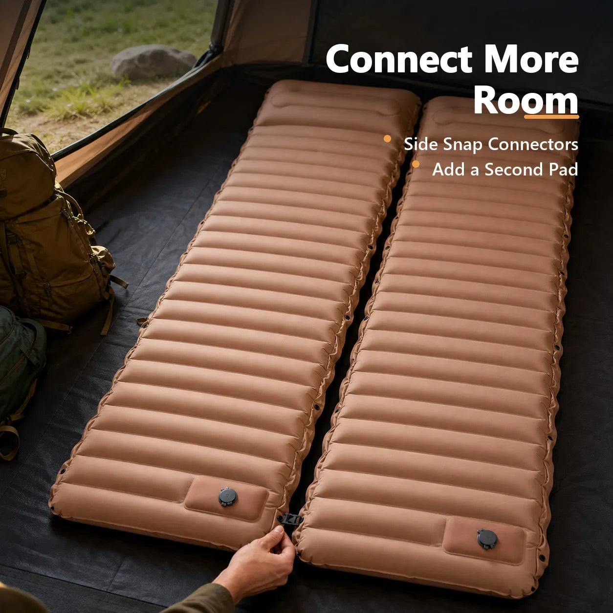 Two compatible camping mattresses connected side by side