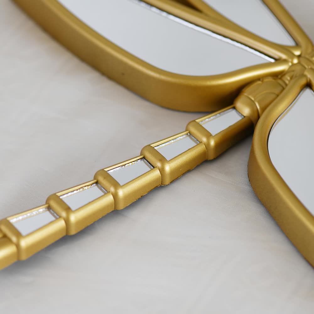 Close view of the segmented mirror-inset dragonfly tail