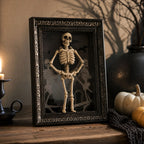 Skeleton frame with pumpkins and candlelit fall decor