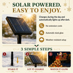 Solar Santa sleigh setup steps showing stake, charging panel, and nighttime glow